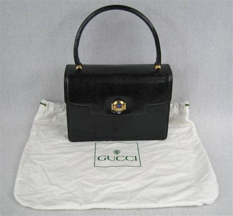 vintage gucci bag black and tan|silver gucci handbags old fashioned.